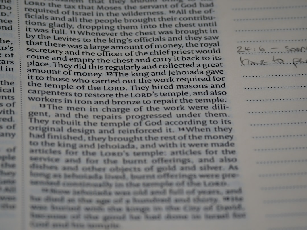 a close up of a book with writing on it